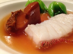 Braised abalone cube with star garoupa fillet in supreme oyster sauce