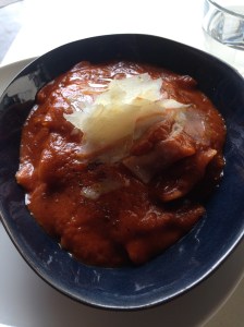 Ravioli with tomato sauce and parmesan