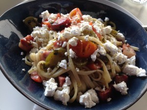 Spaghetti with cherry tomatoes, chorizo and feta