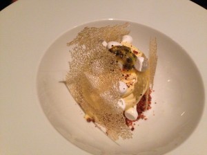 Aerated passionfruit, roasted nougatine, passionfruit ice cream, passionfruit seed powder, glass biscuit