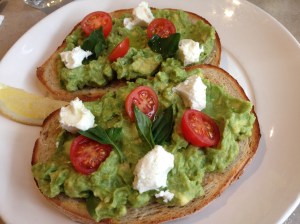 Smashed avocado toast with Meredith goat’s feta, cherry tomatoes, chilli, basil & lemon infused olive oil