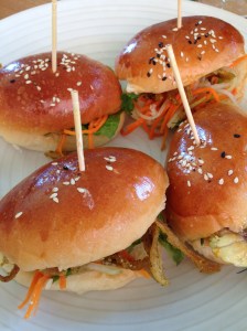 Bahn mi - crispy pigs ears with pickles and peanuts; and Ha Noi fish with turmeric, dill and mayo