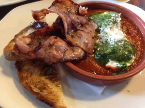 Eggs in Pergatory with a side of bacon