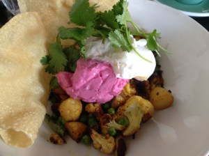 Smoked cauliflower and potato hash, poached eggs and beetroot riata